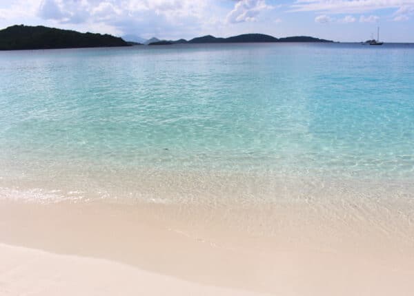 blue water and white sand beach in the usvi